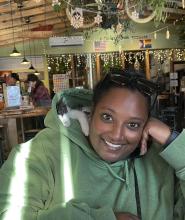 Just me with a kitten in my hood