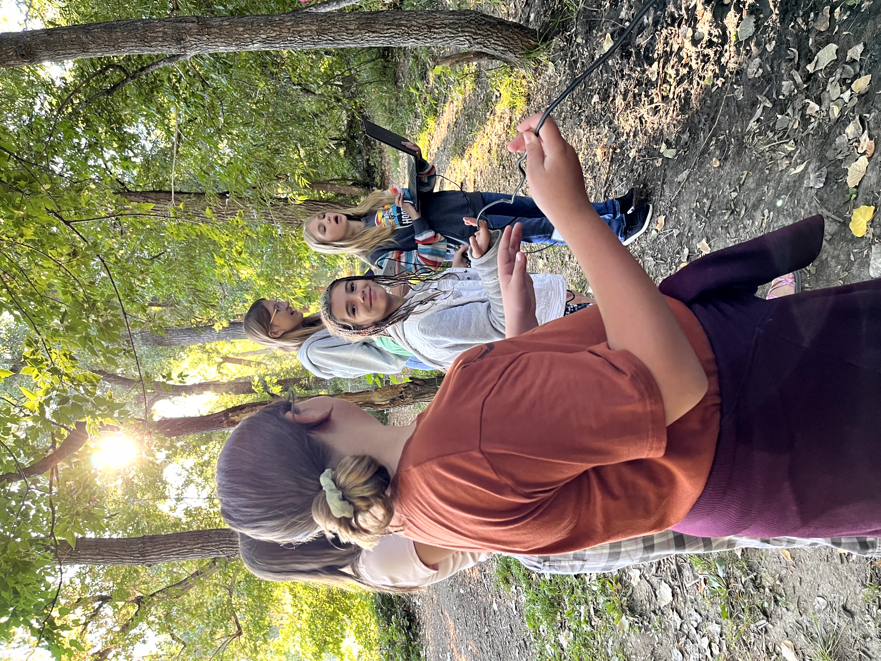 Group of girls setting up science probe